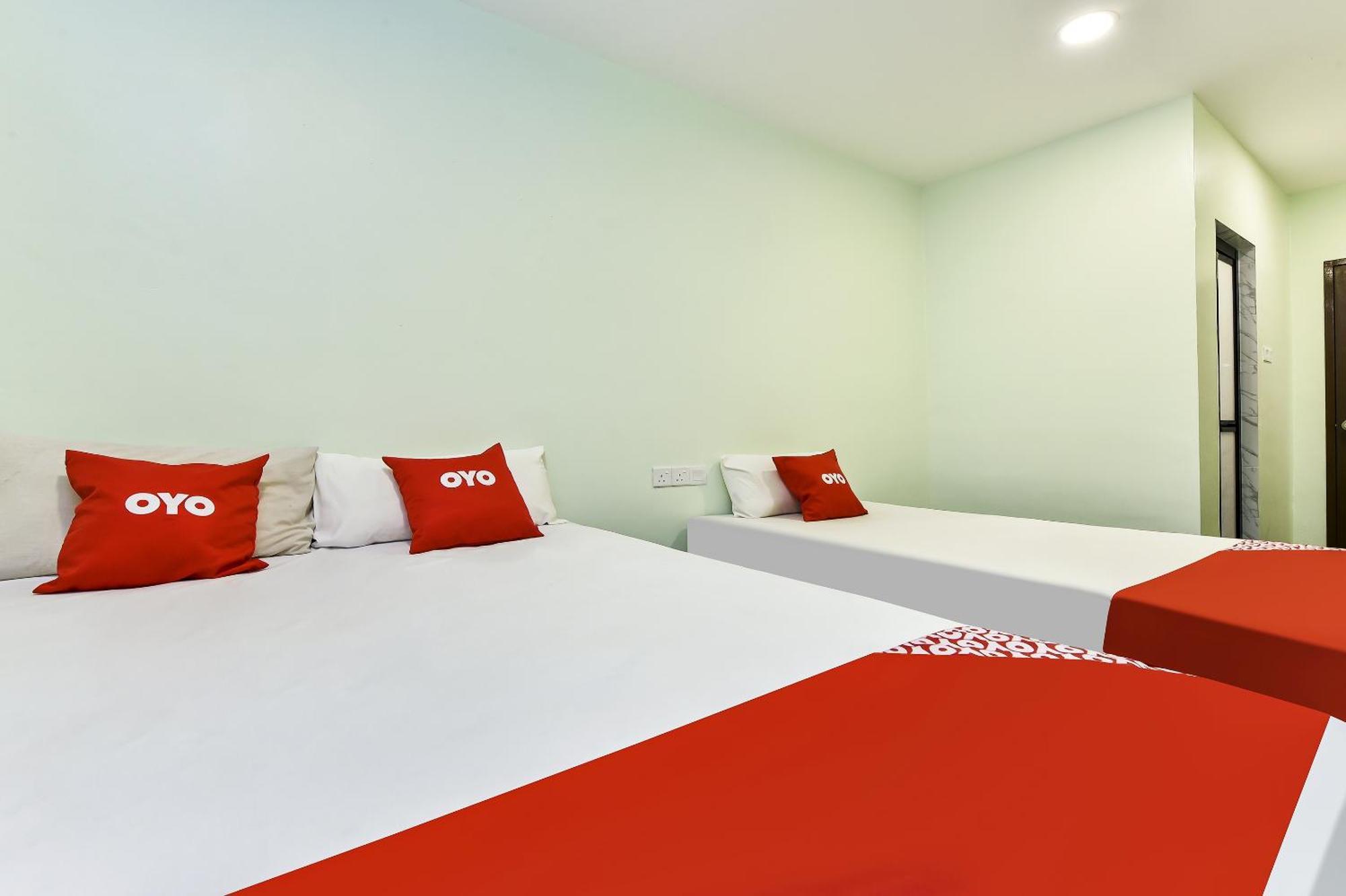 Oyo 90445 Th Hotel Bahau Экстерьер фото