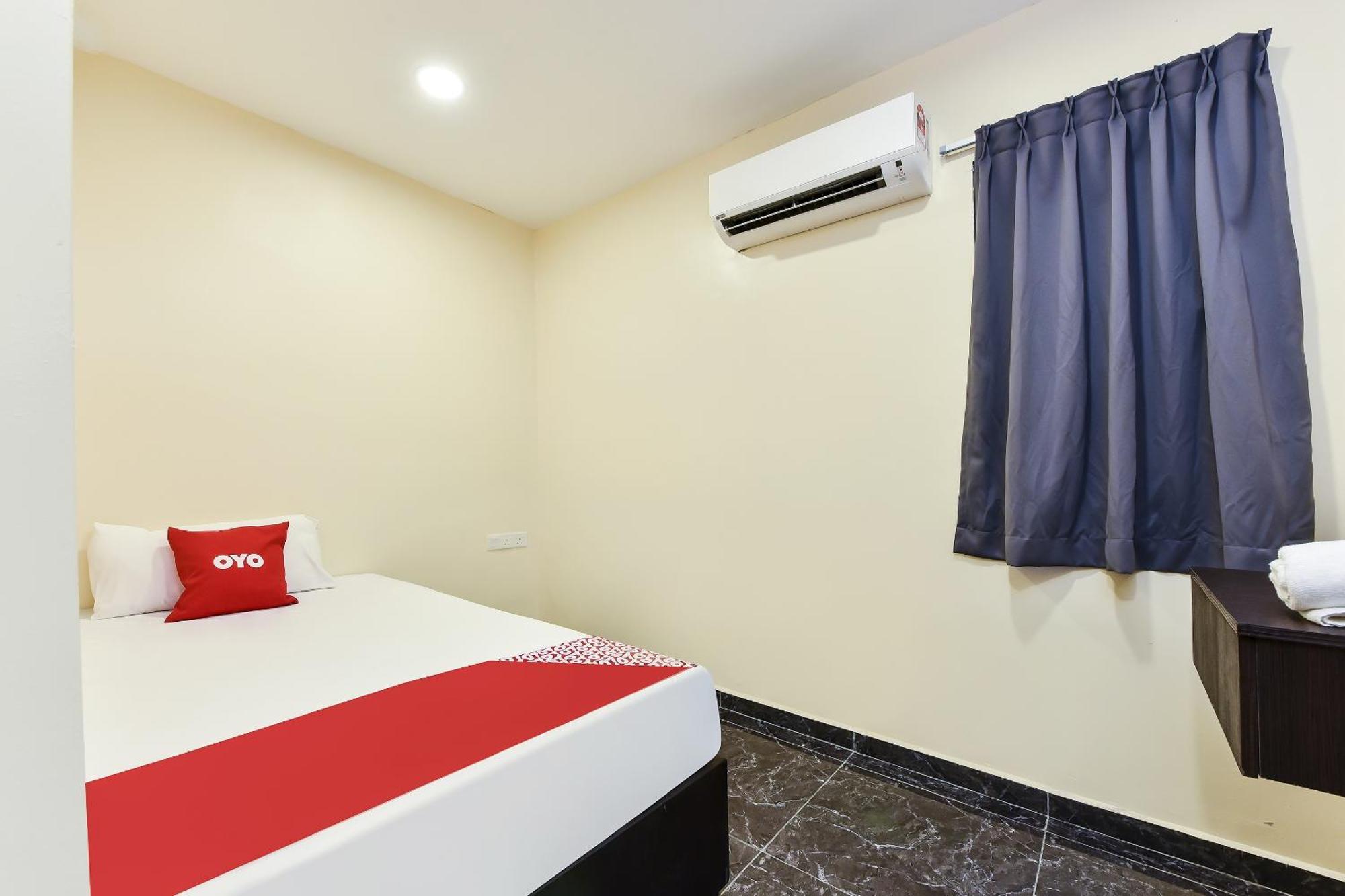 Oyo 90445 Th Hotel Bahau Экстерьер фото